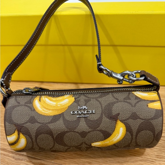 Coach Handbags - Nolita Barrel Bag In Signature Canvas With Banana Print